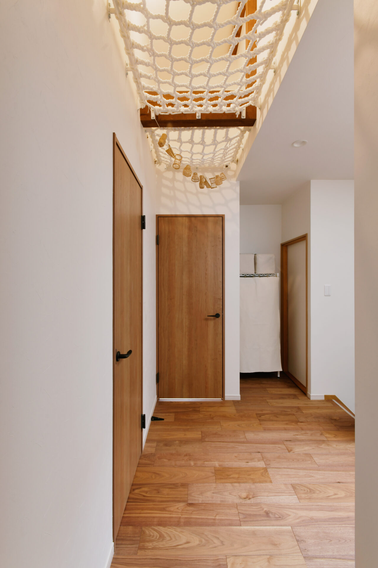 天井裏空間を活用。ロフトとアスレチックネットのあるお家